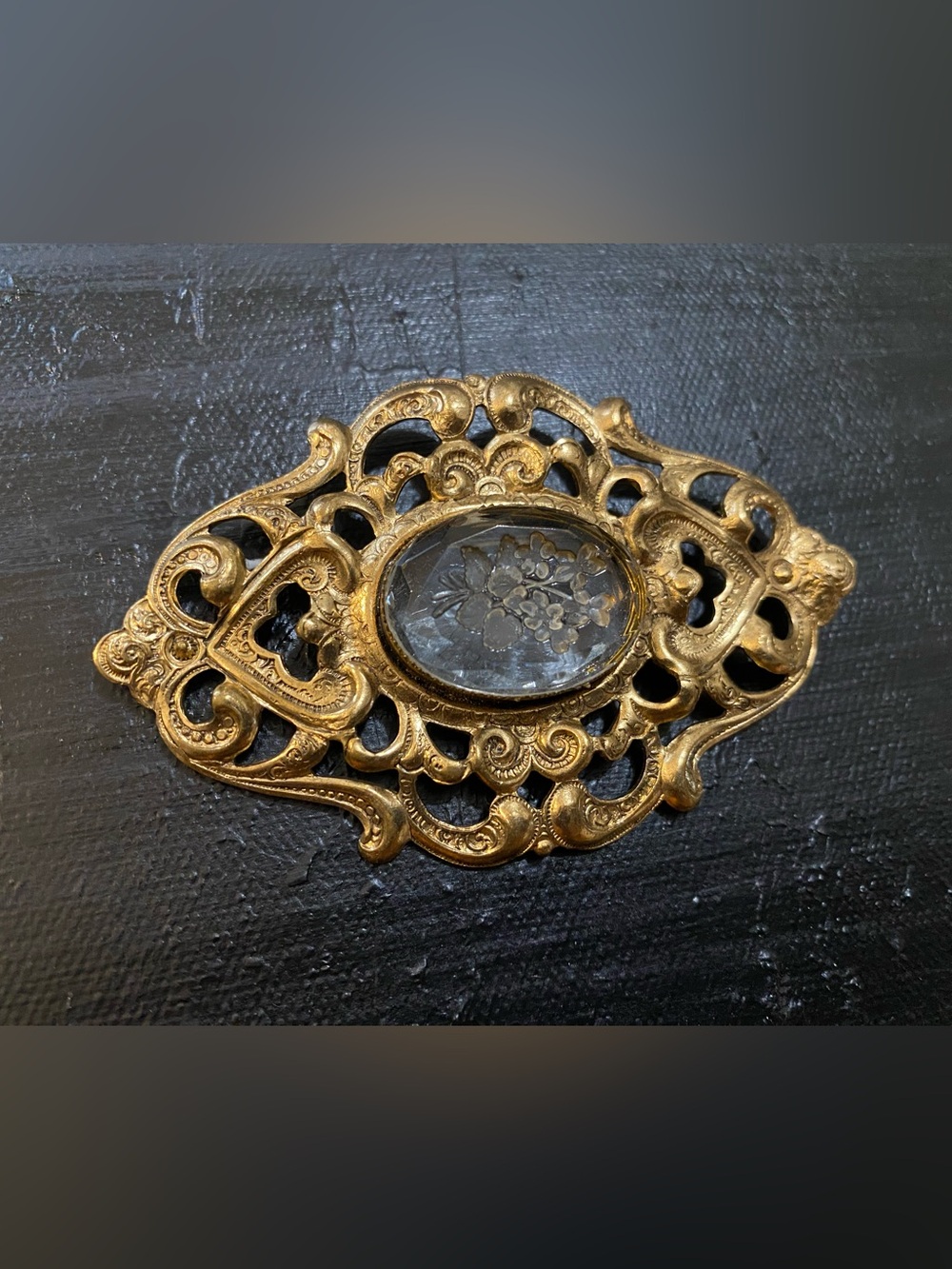 Vintage brooch with clear, floral detail